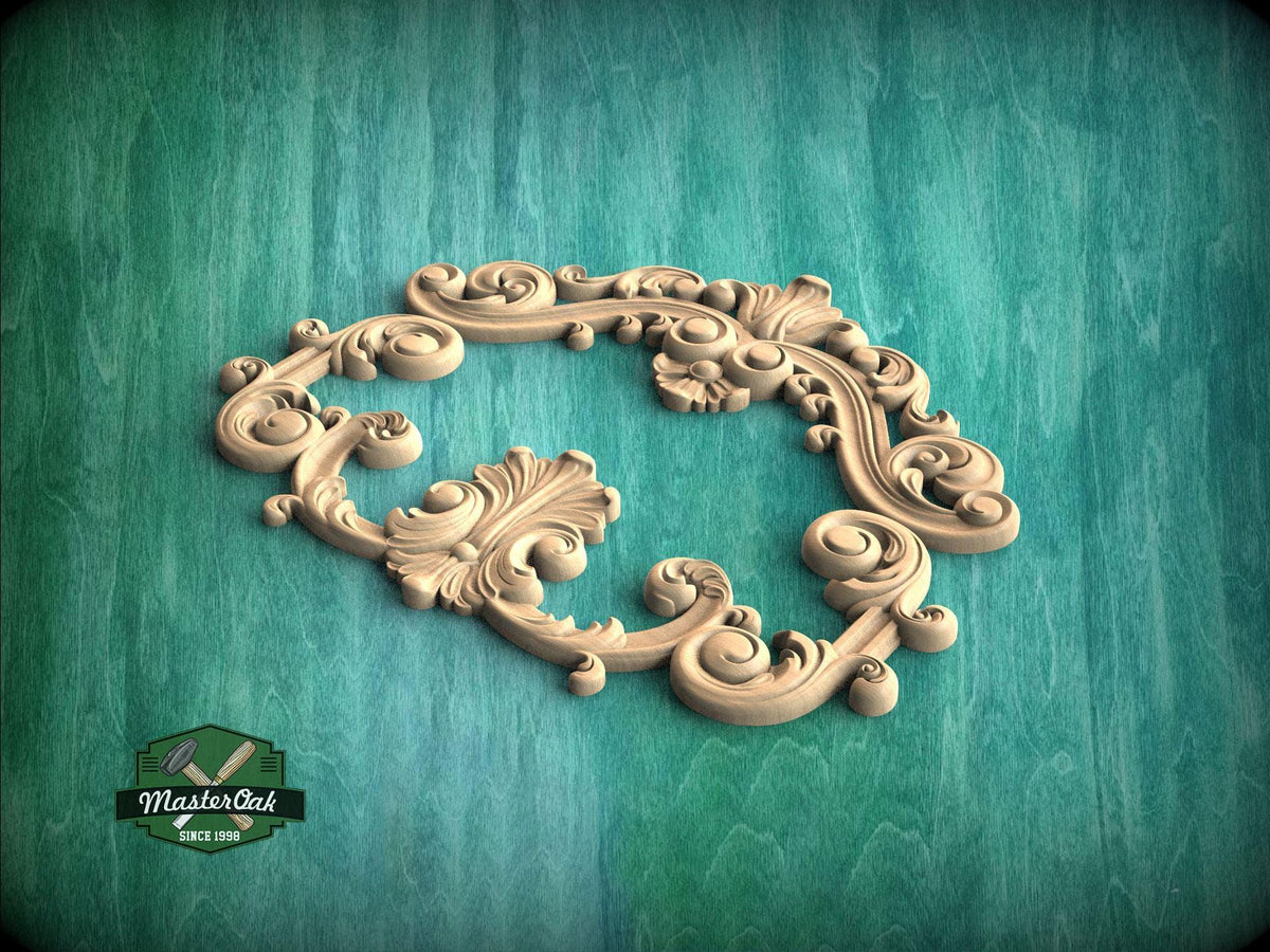 A decorative wooden frame with intricate scrollwork and floral patterns is displayed against a teal background.