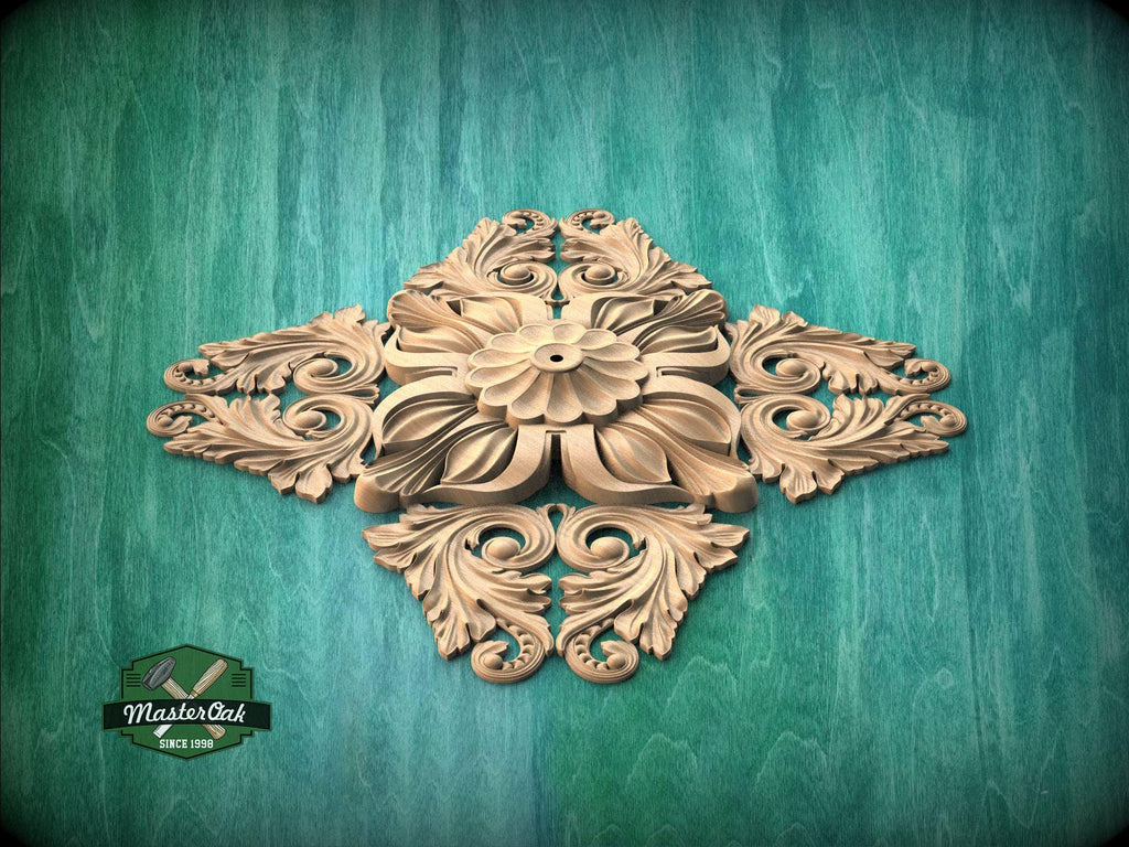 a decorative wooden piece with intricate carvings, displayed against a green wooden background.