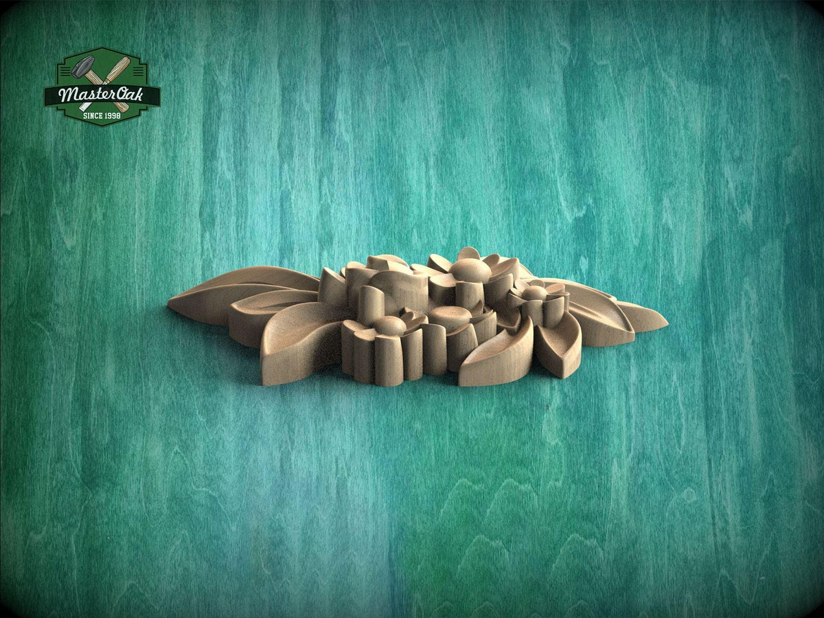 A wooden carving of a flower-like shape is displayed against a teal-colored background.