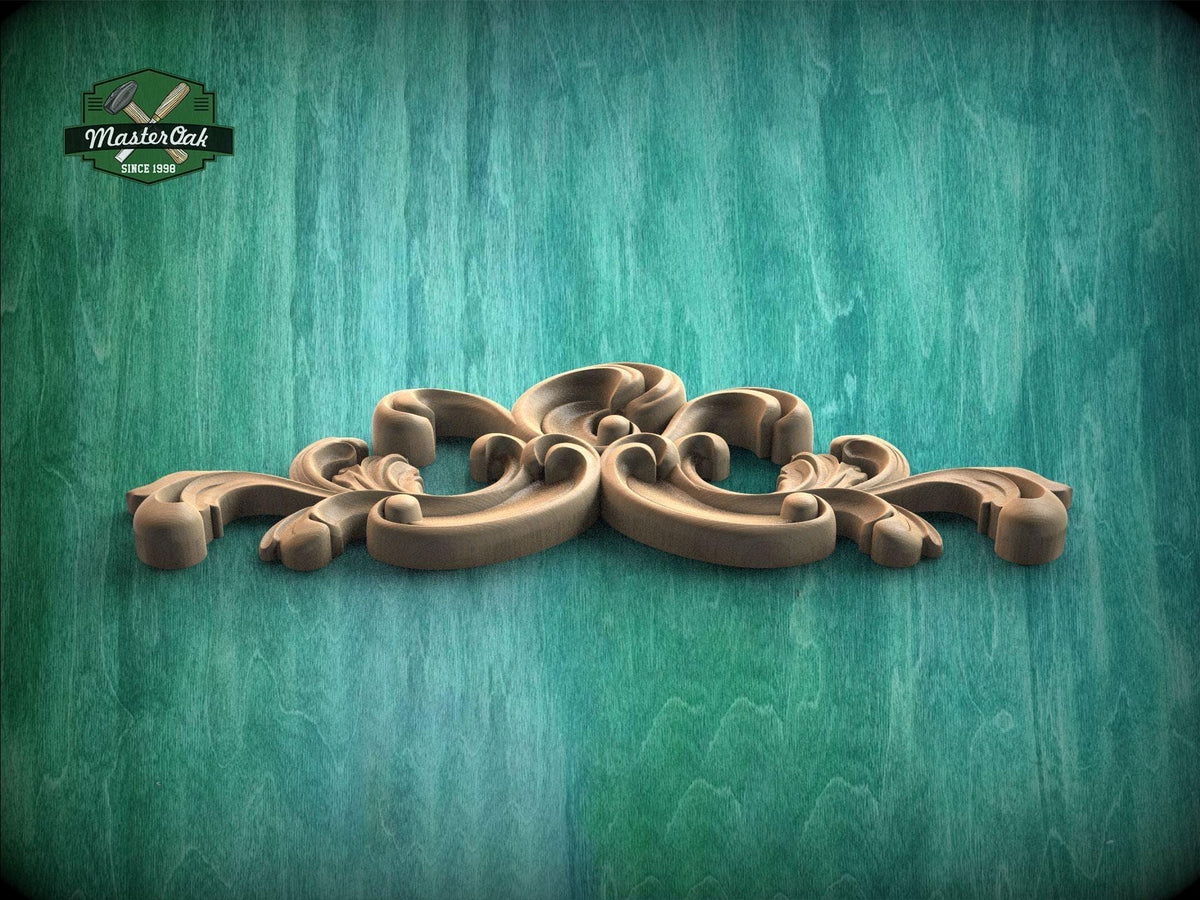 A decorative wooden carving with intricate scrollwork is displayed against a textured green background.