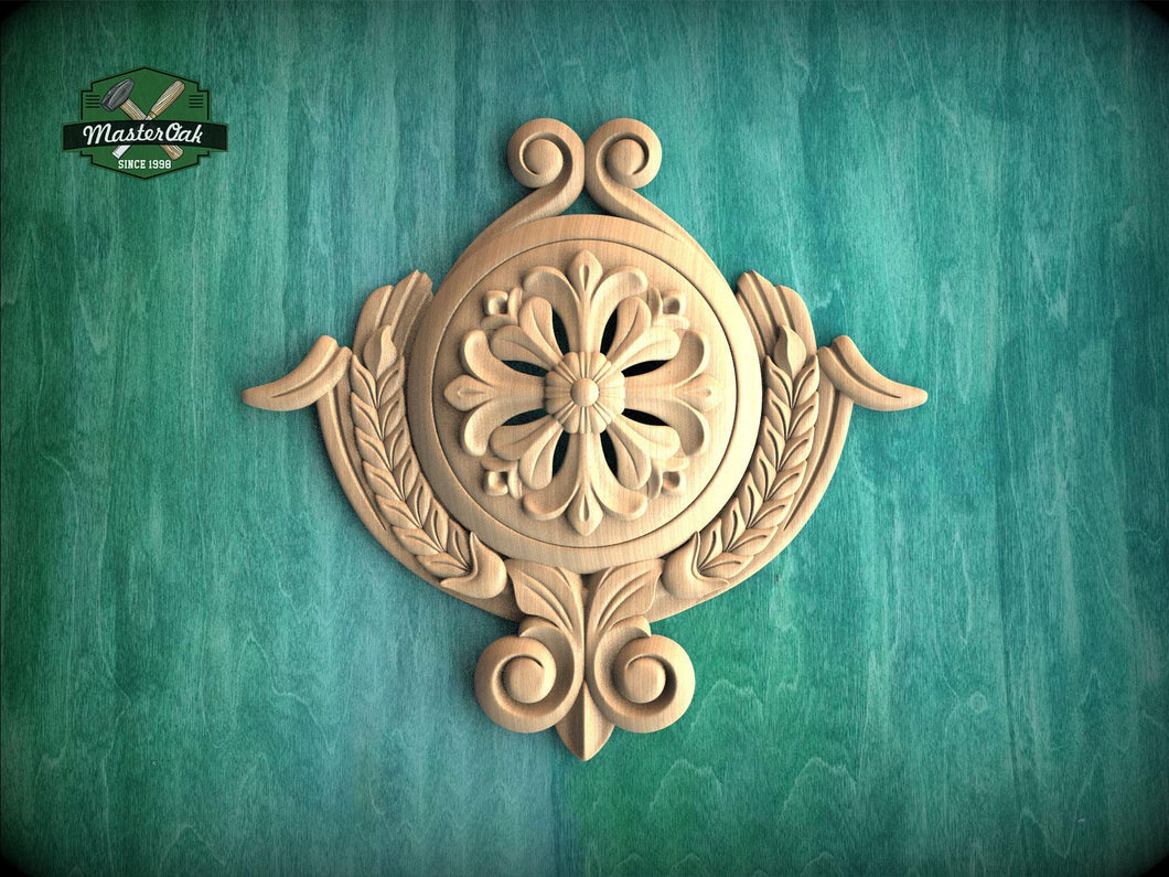 a beautifully carved wooden piece with a floral design, set against a green background.