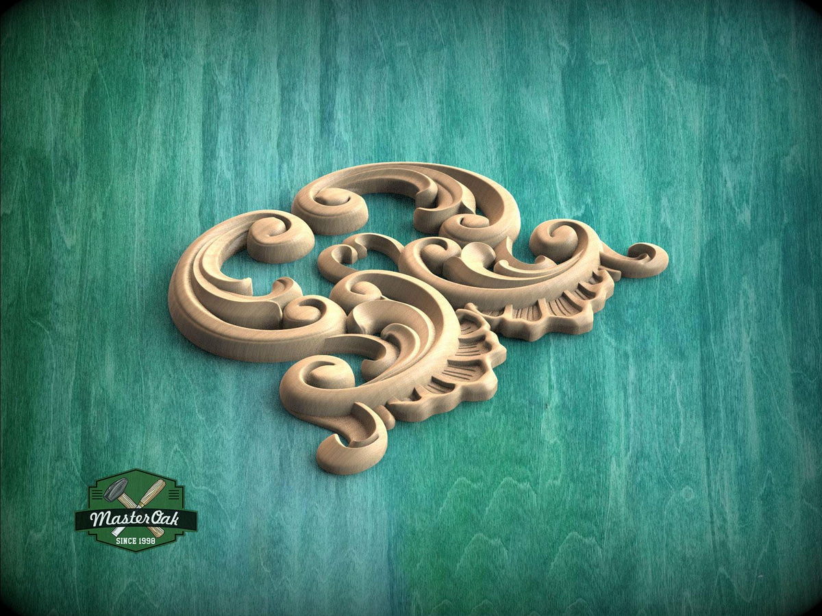 A decorative wooden carving with intricate scrollwork is displayed against a teal-colored background.