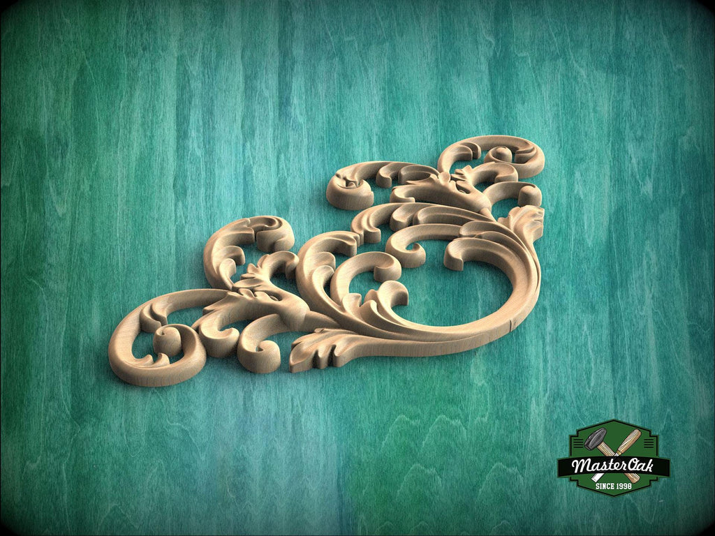 A decorative wooden carving with intricate scrollwork is displayed against a green textured background.