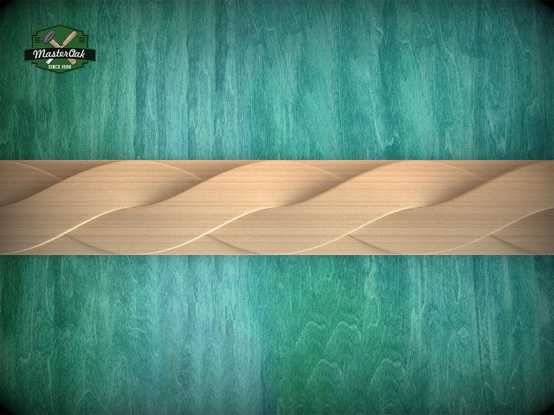 a close-up view of a wooden surface with a wavy pattern, and a light brown border running horizontally across it.