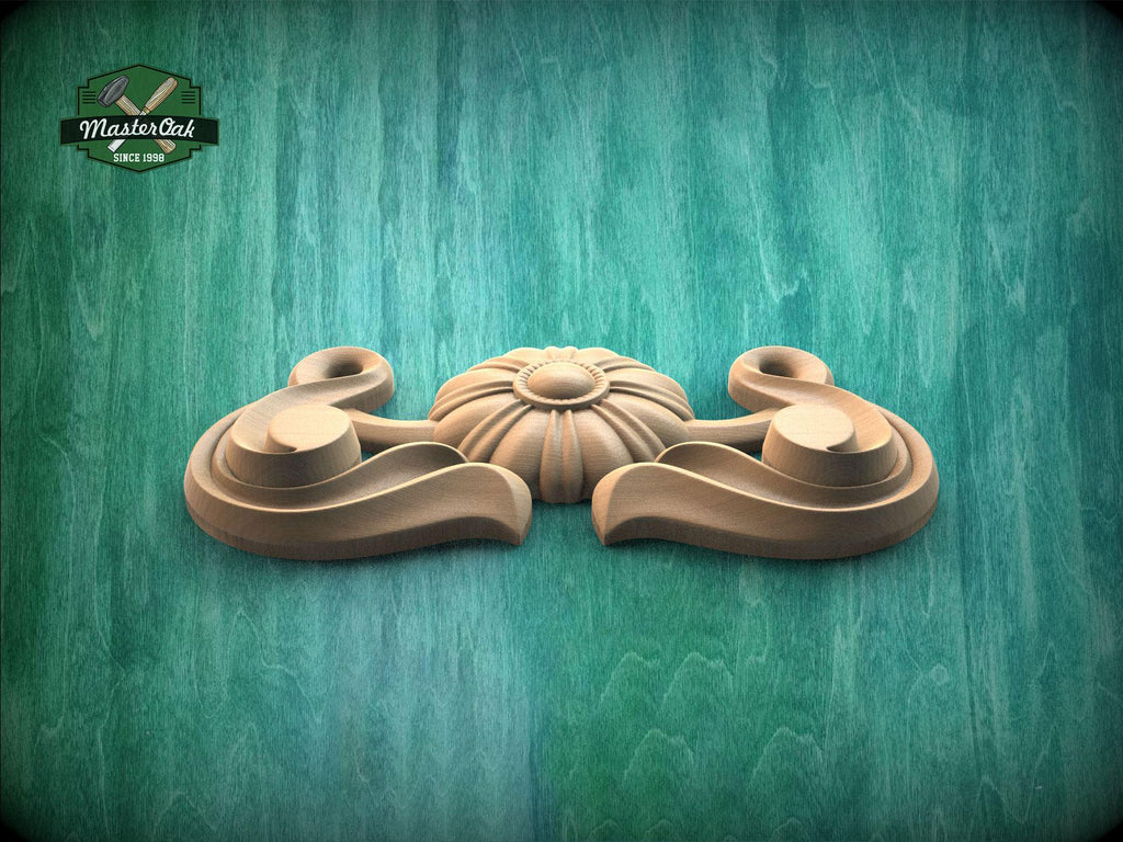 A wooden carving with a floral design is displayed against a green background.