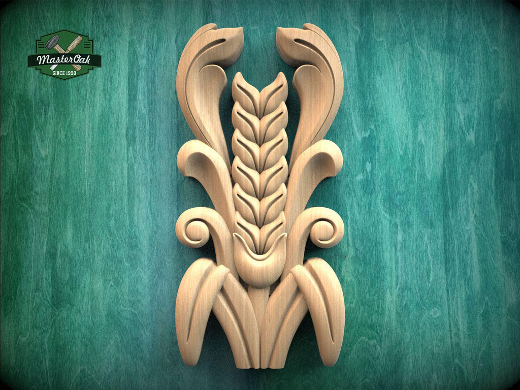 a carved wooden design with a stylized wheat stalk and leaves, set against a green background.