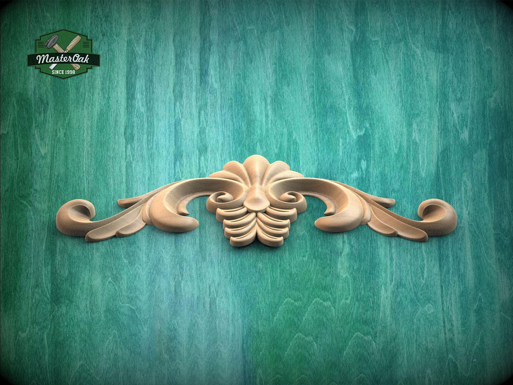 a wooden carving of a flower on a green background