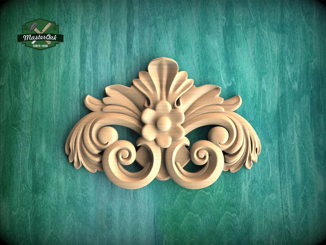 a decorative wooden carving on a green background.