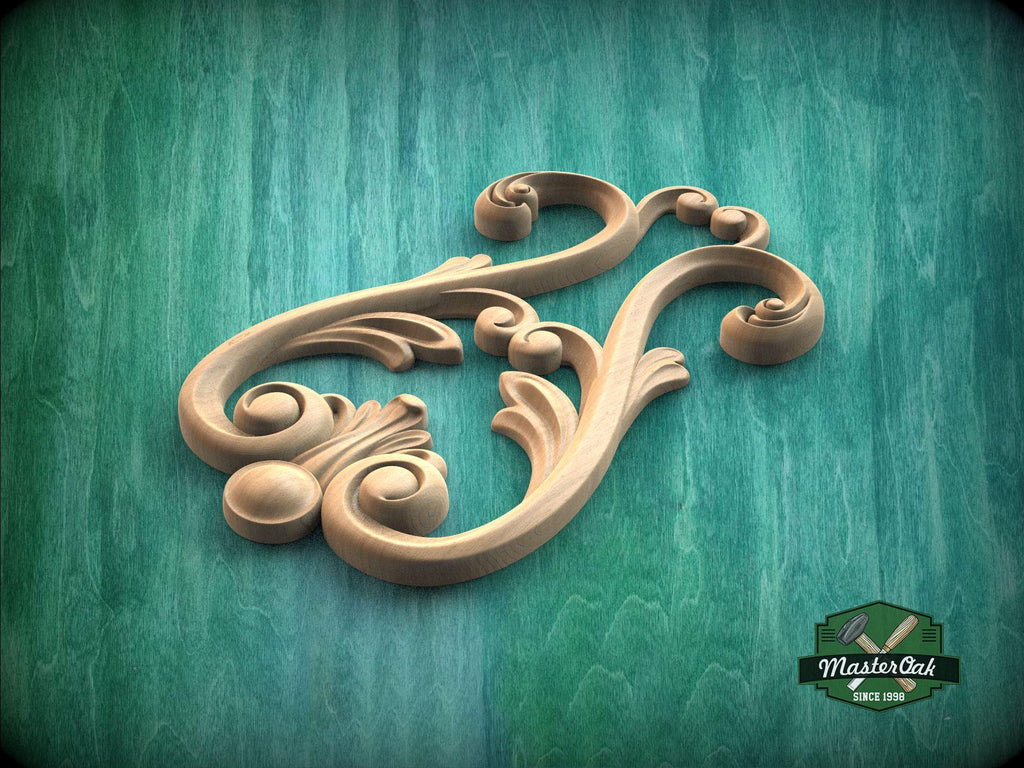 A decorative wooden carving with intricate scrollwork and floral elements is displayed against a green background.
