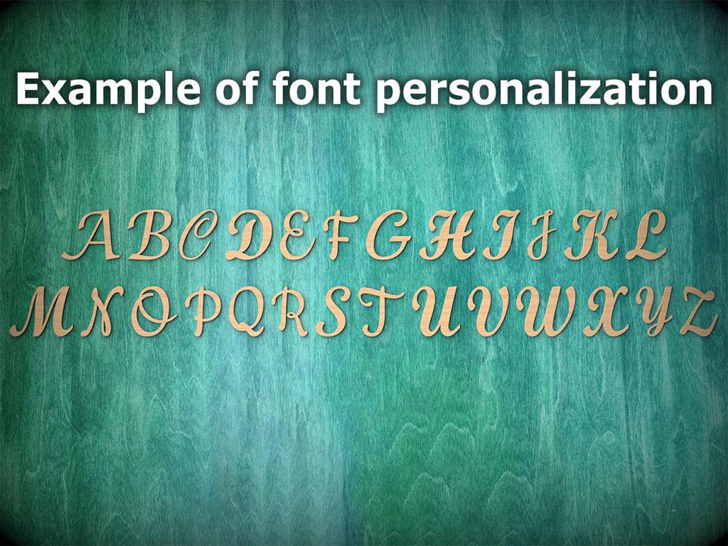 a close-up view of a wooden surface with a greenish-blue background. The text "Example of font personalization" is written above the image, and the letters "A" through "Z" are shown in a cursive font, suggesting a personalized font or design.