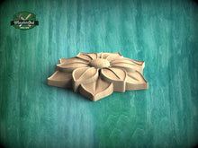 Load image into Gallery viewer, A wooden flower-shaped object is displayed against a green background.
