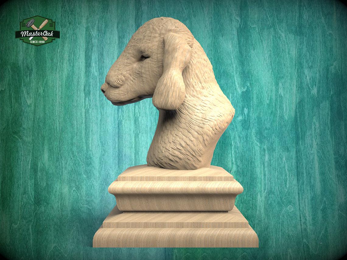 A wooden bust of a dog's head is displayed on a wooden pedestal against a green background.