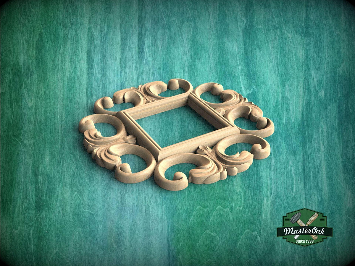 A wooden ornate frame with intricate scrollwork is displayed against a green textured background.