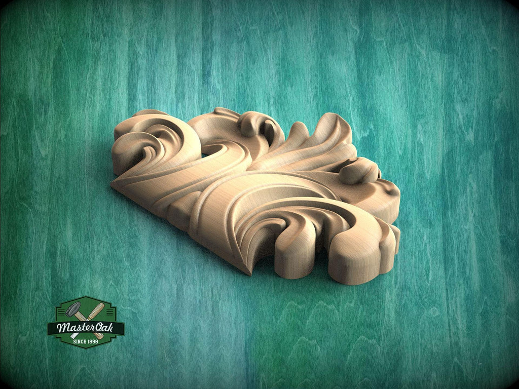 A wooden carving of a stylized leaf or flower design is displayed against a green background.