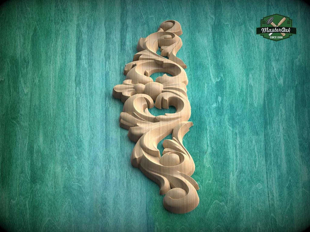 a decorative wooden carving on a green background.
