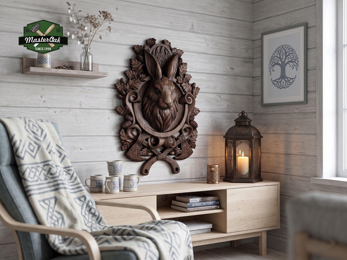 May include: A detailed, dark brown wooden wall carving of a rabbit's head, surrounded by leaves and crossed axes. The carving is mounted on a light wood-paneled wall. A framed tree art print and a lit candle lantern are also visible.