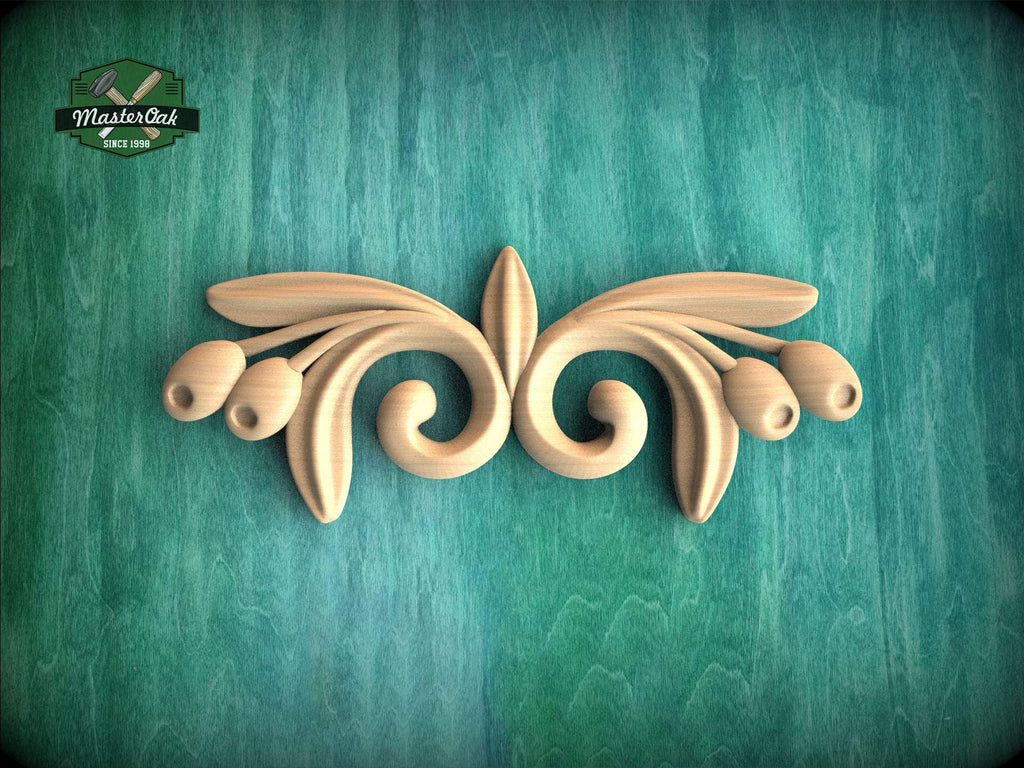 A decorative wooden carving in the shape of a stylized flower or leaf design is displayed against a green textured background.