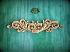 Personalized Decorative Scroll Crest with Curved Motif for Furniture Tops
