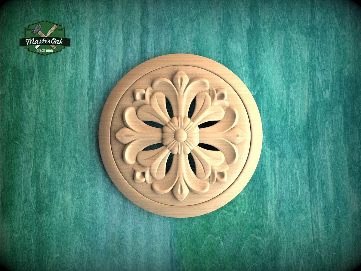 A wooden ornamental piece with a floral design is displayed against a green textured background.