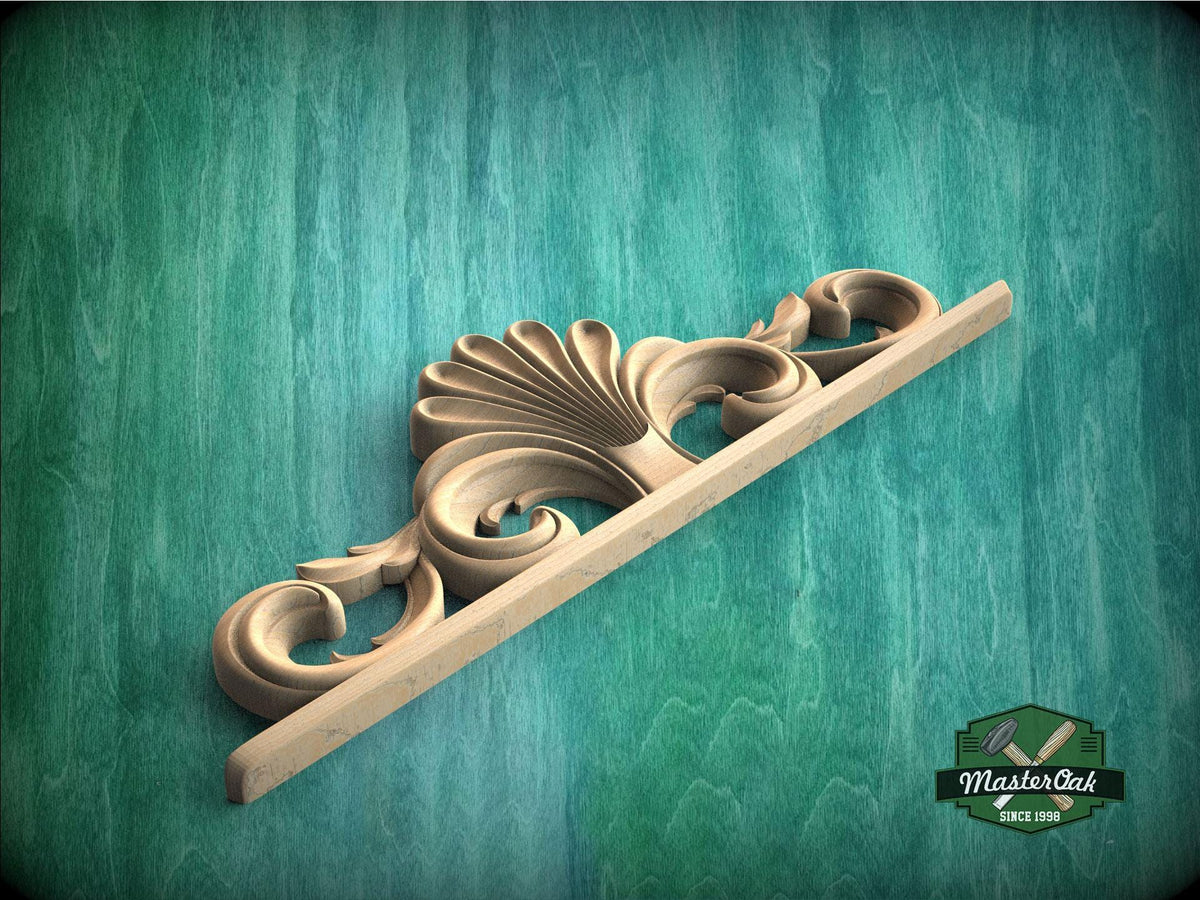 A decorative wooden carving with a floral design is displayed against a green textured background.