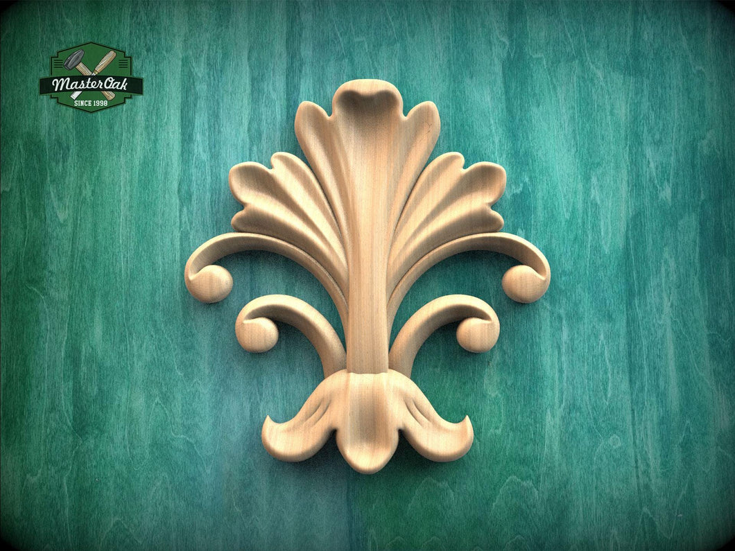 a decorative wooden leaf-like design on a green background.