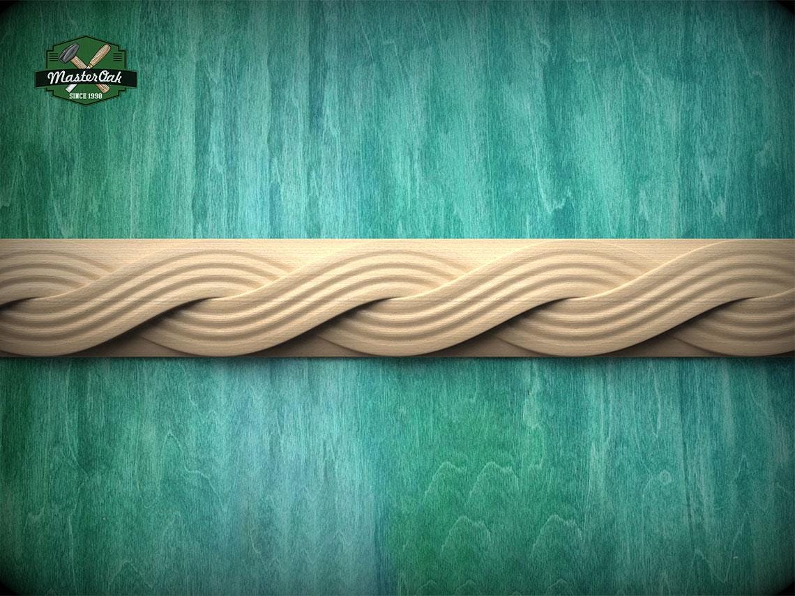 a wooden border with a wavy pattern, set against a green background.