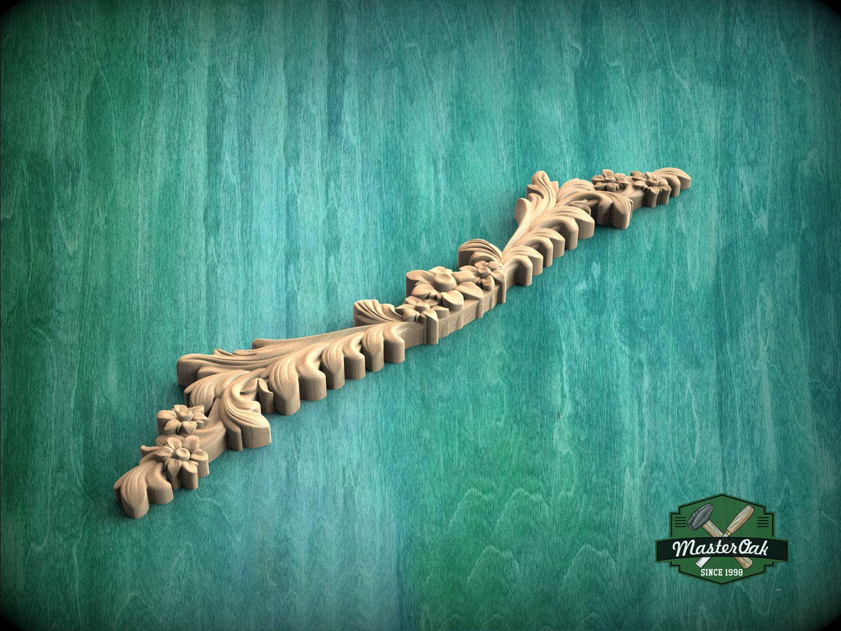 a wooden carving of a plant on a green background