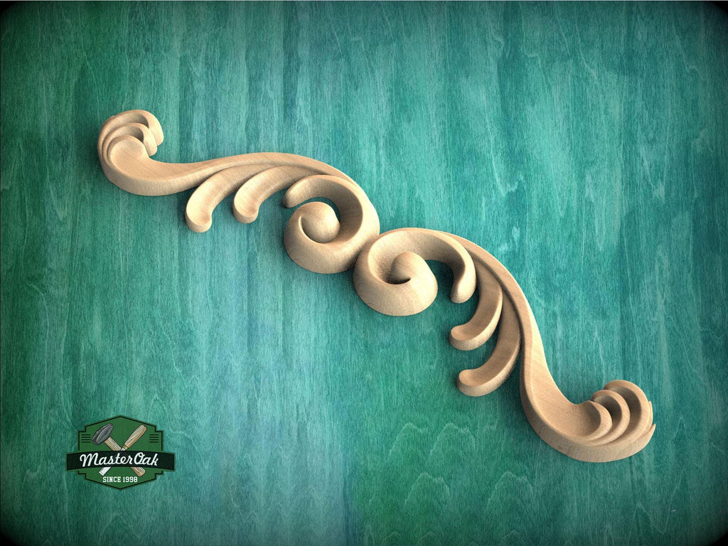 a wood carving of a swirl on a green background