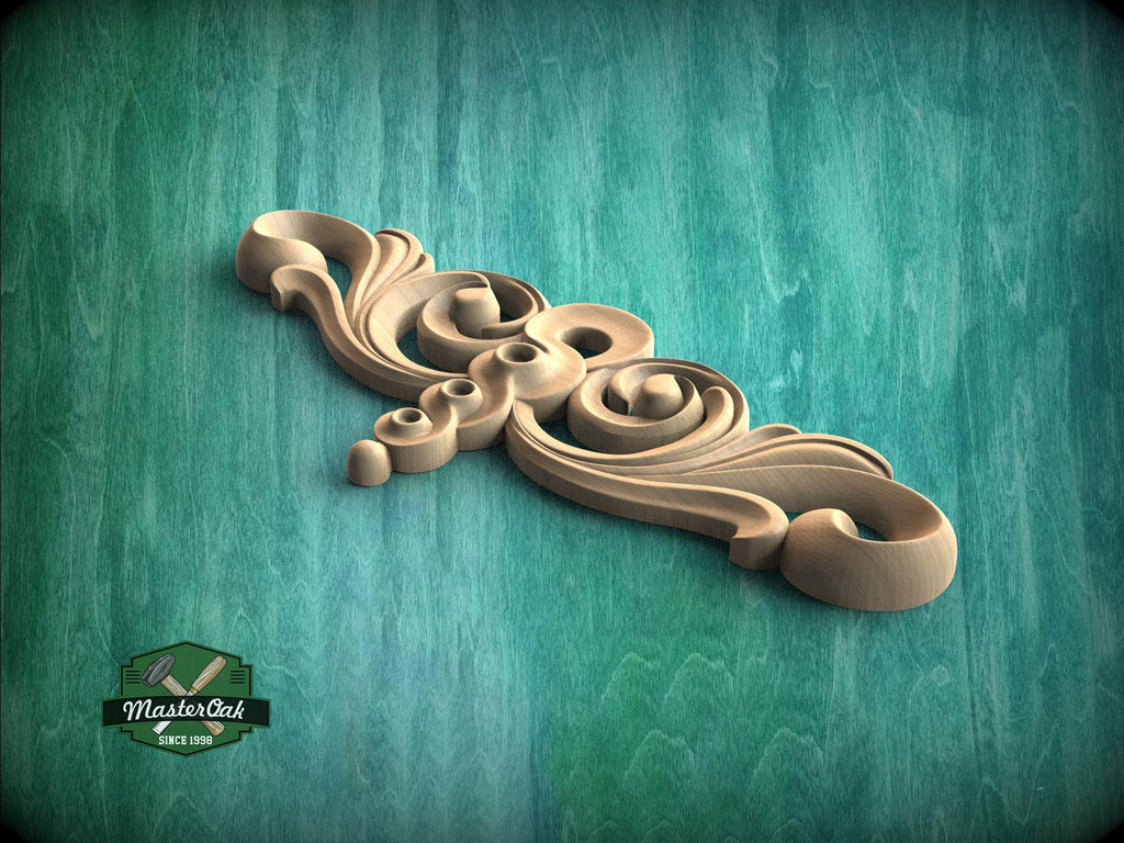 A decorative wooden carving with intricate swirls and curves is displayed against a teal-colored background.