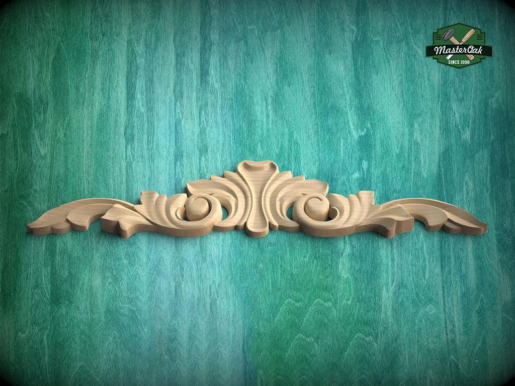A decorative wooden carving is displayed against a teal-colored background.