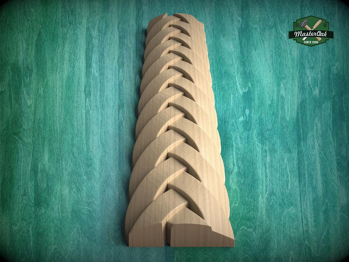 A wooden carving of a braided pattern is displayed against a green background.