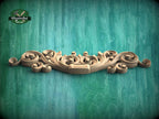 a wood carving pattern on a green background