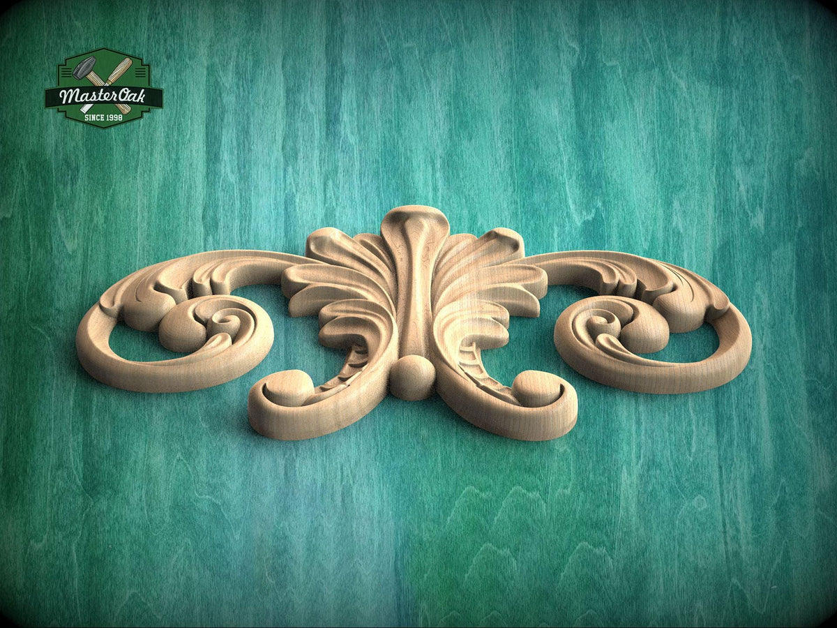 A decorative wooden carving with intricate scrollwork is displayed against a teal-colored background.