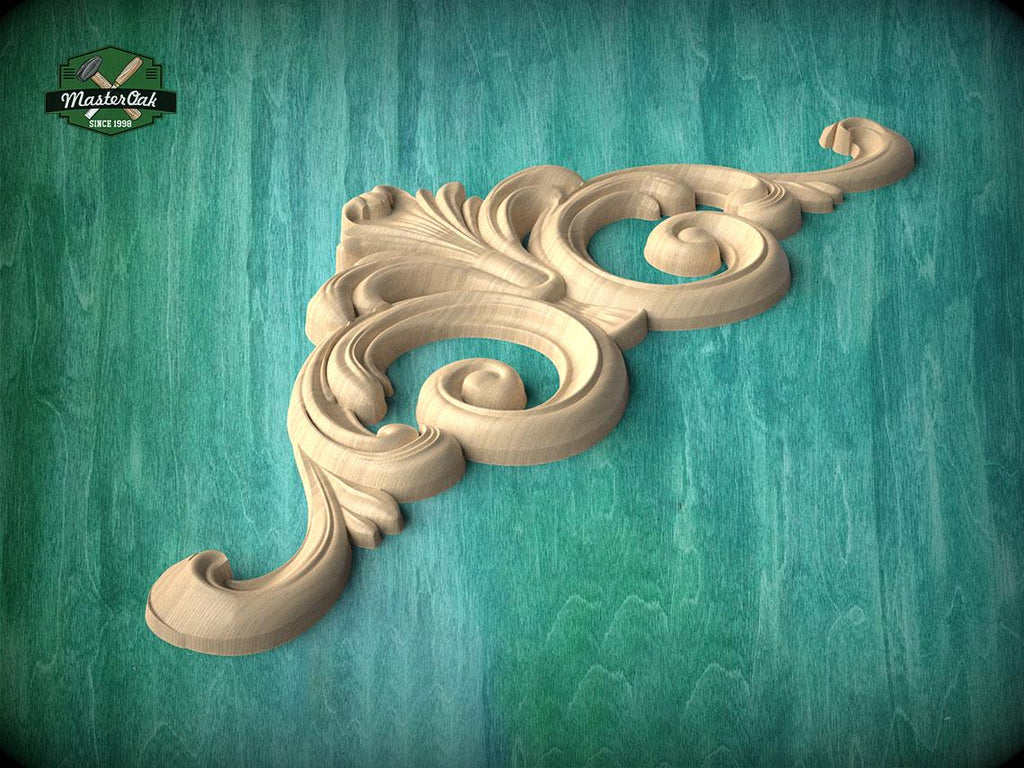 A decorative wooden carving with intricate scrollwork is displayed against a teal background.