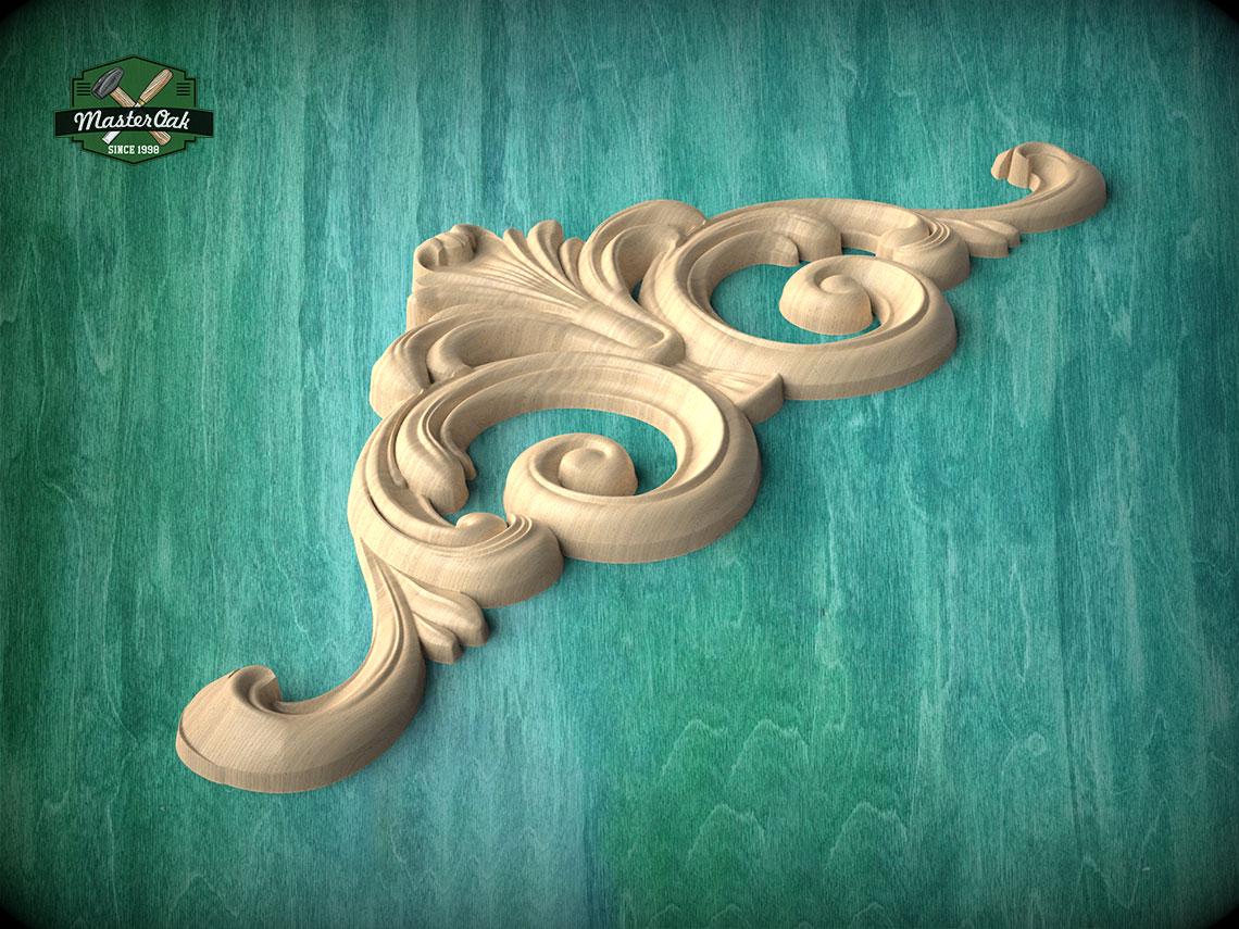 A decorative wooden carving with intricate scrollwork is displayed against a teal background.