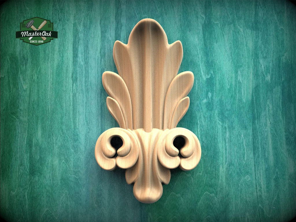 a decorative wooden sculpture with an intricate, ornate design on a green textured background.