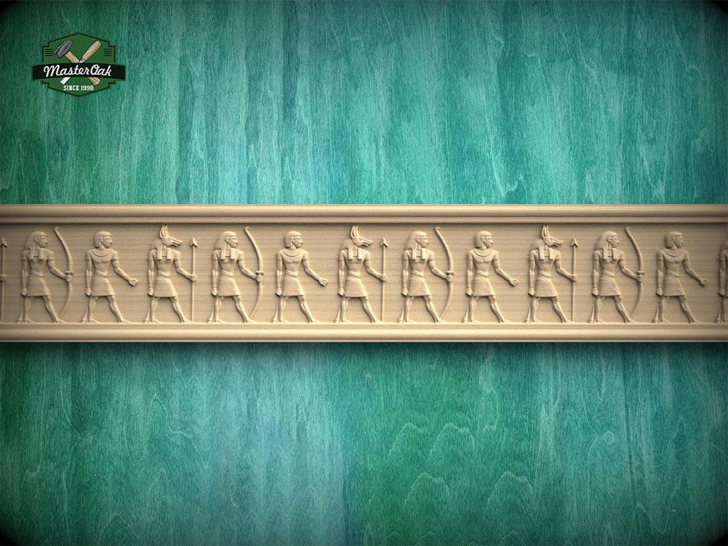 a row of carved figures on a wooden surface, with a teal-colored background.