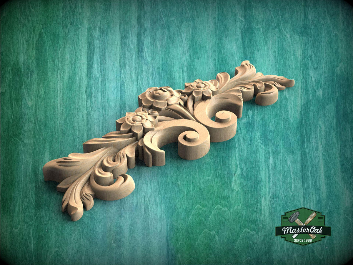 a wood carving of a flower and leaves on a green background
