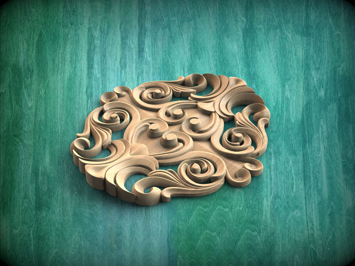 A decorative wooden carving with intricate swirls and curves is displayed against a green background.