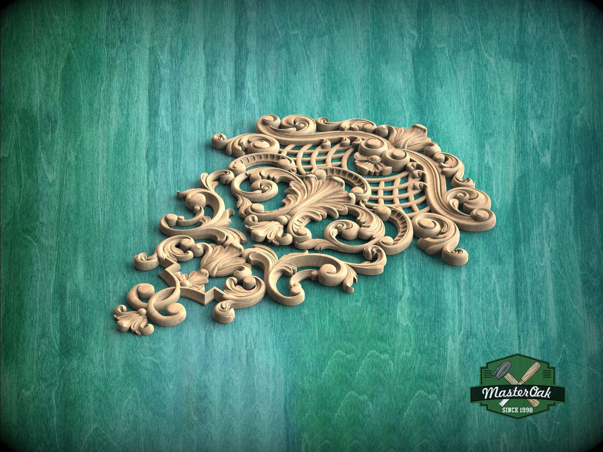 an ornate, carved wooden piece with intricate scrollwork and floral designs, set against a green background.