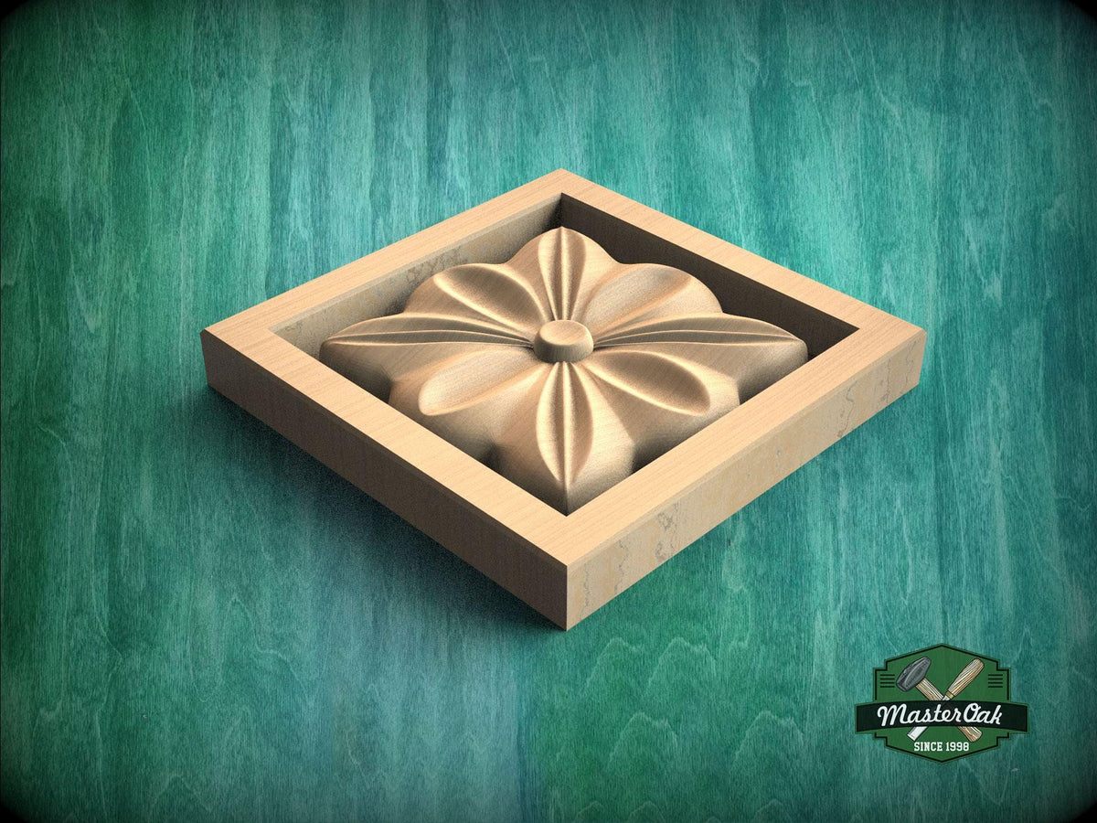 A wooden flower-shaped cutout is displayed in a square wooden frame against a green background.