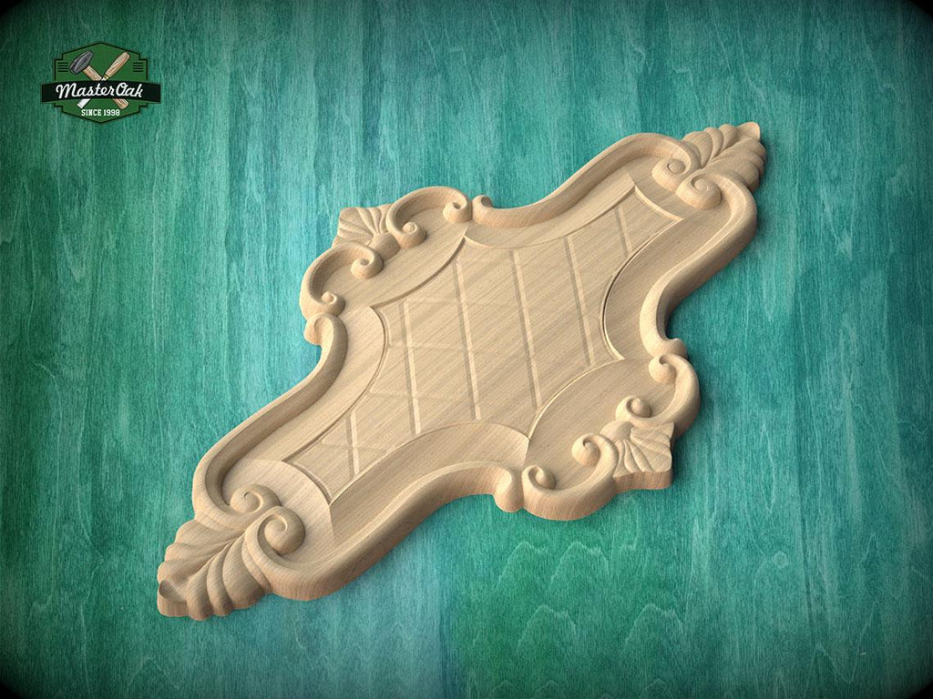 a wooden carving with intricate designs, placed on a green wooden surface.