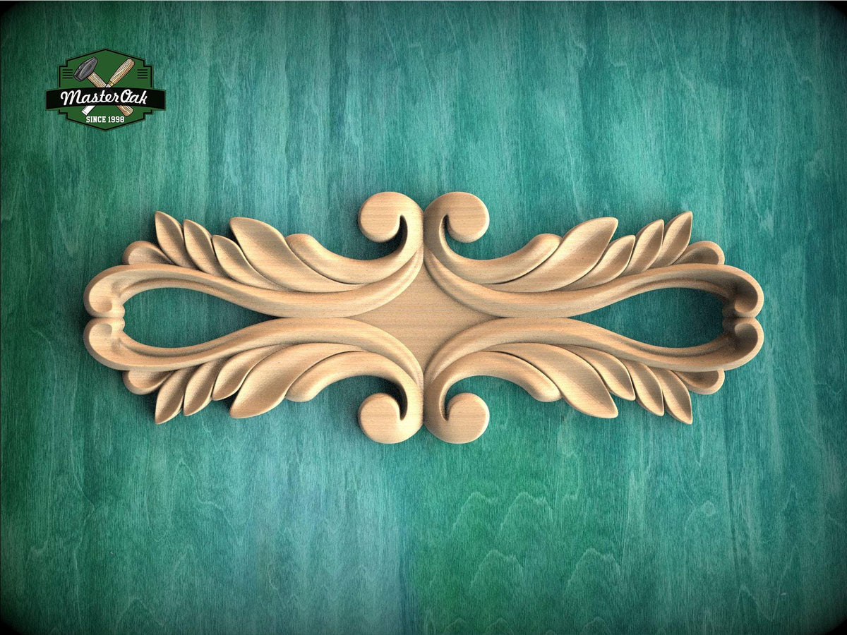 a decorative wooden carving on a green background.