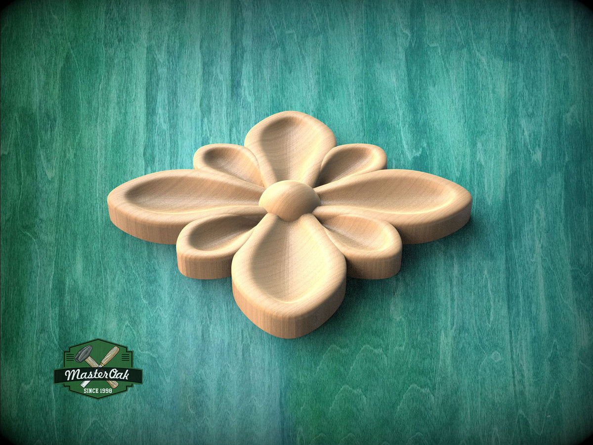A wooden flower-shaped object is displayed against a green background.