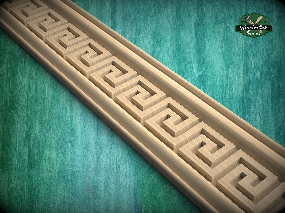 A wooden decorative trim with a repeating geometric pattern, set against a green textured background.