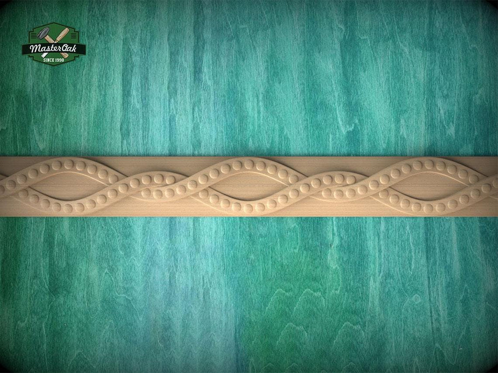 a wooden border with a decorative design on a turquoise background.