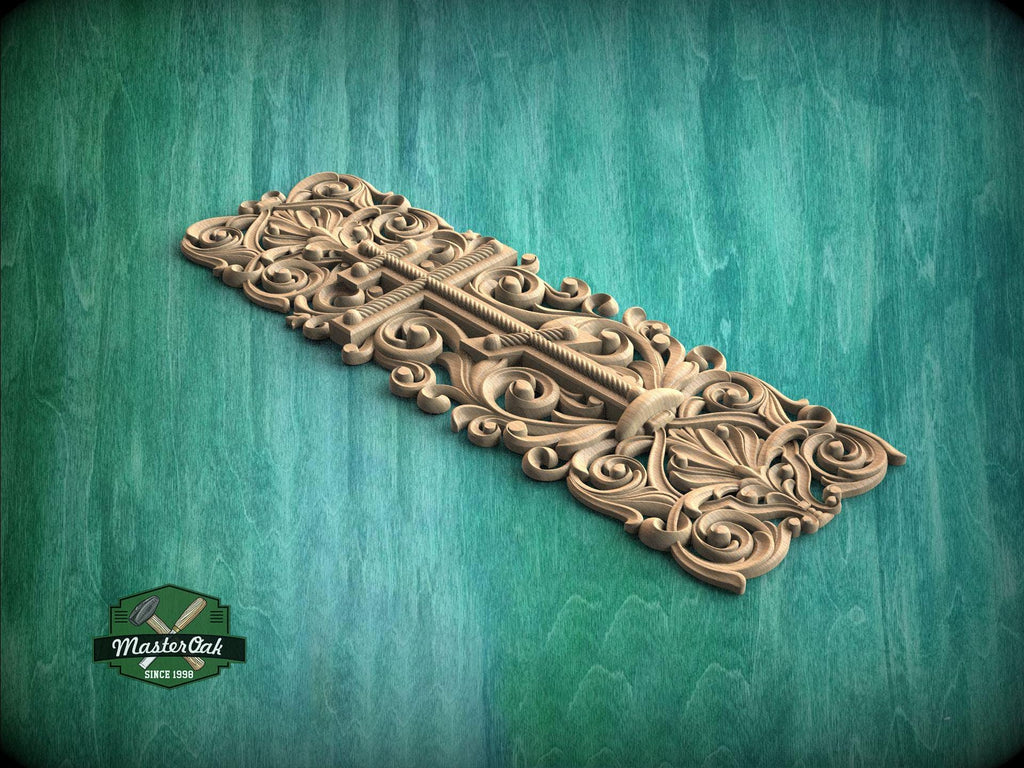 an ornate, carved wooden panel with intricate designs and patterns, set against a green background.
