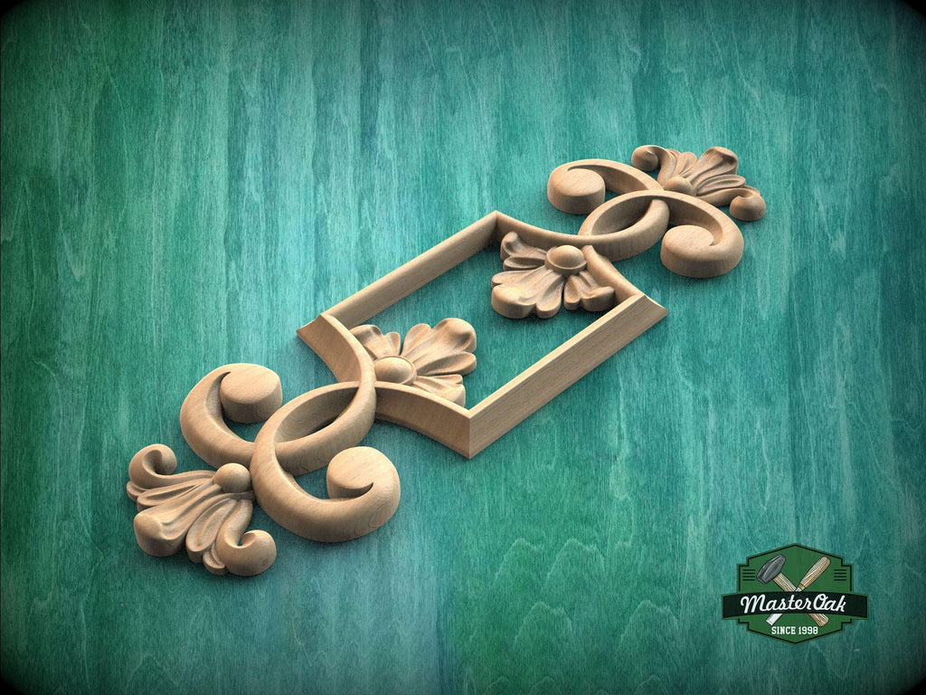 A decorative wooden carving with intricate floral and scrollwork designs is displayed against a green background.