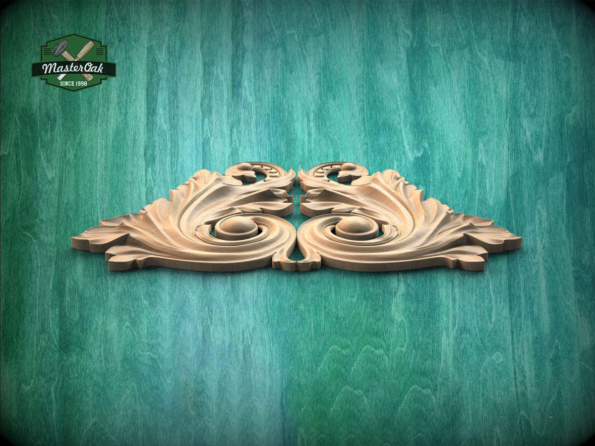 A decorative wooden carving with intricate swirls and curves is displayed against a green textured background.