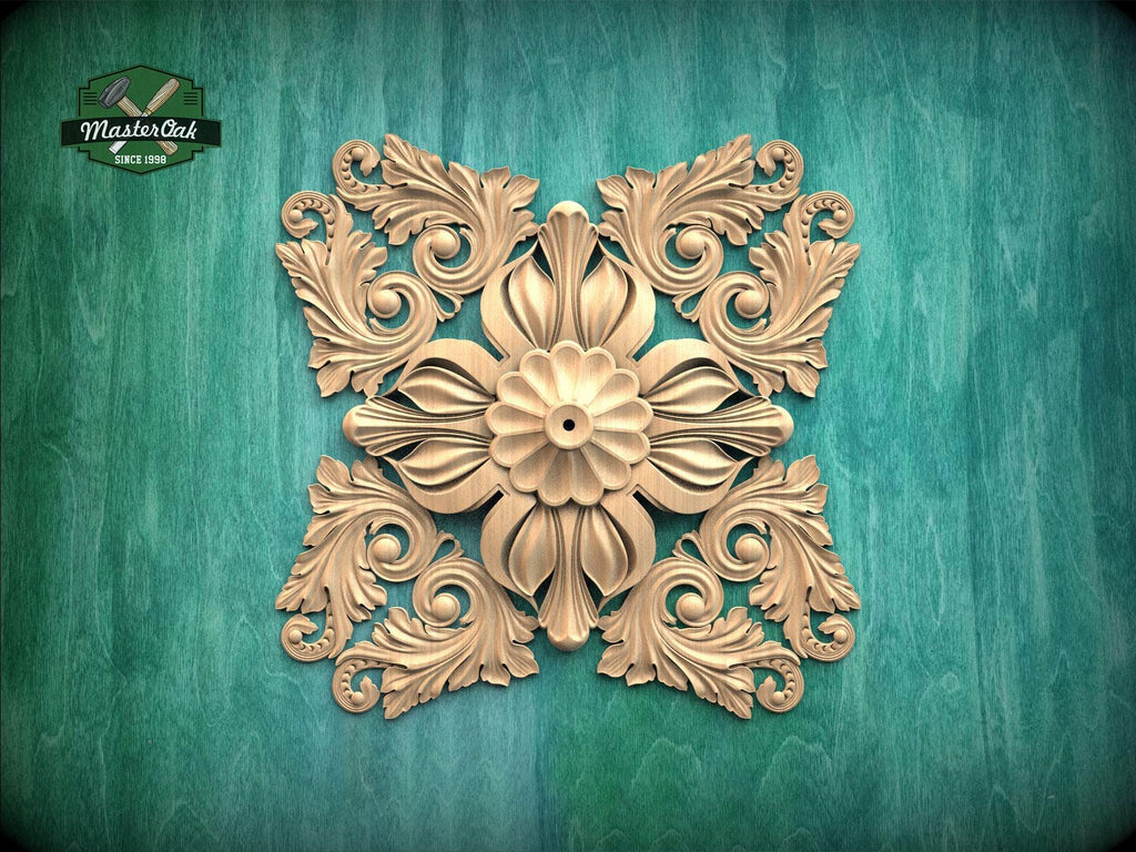 a decorative golden floral pattern on a green background.